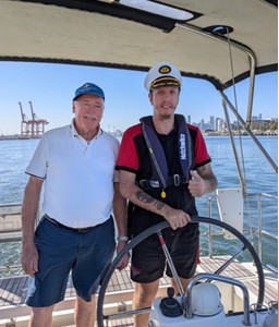 Captain John and Daniel on deck