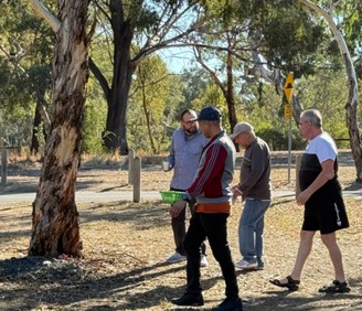 Participants strolling through park
